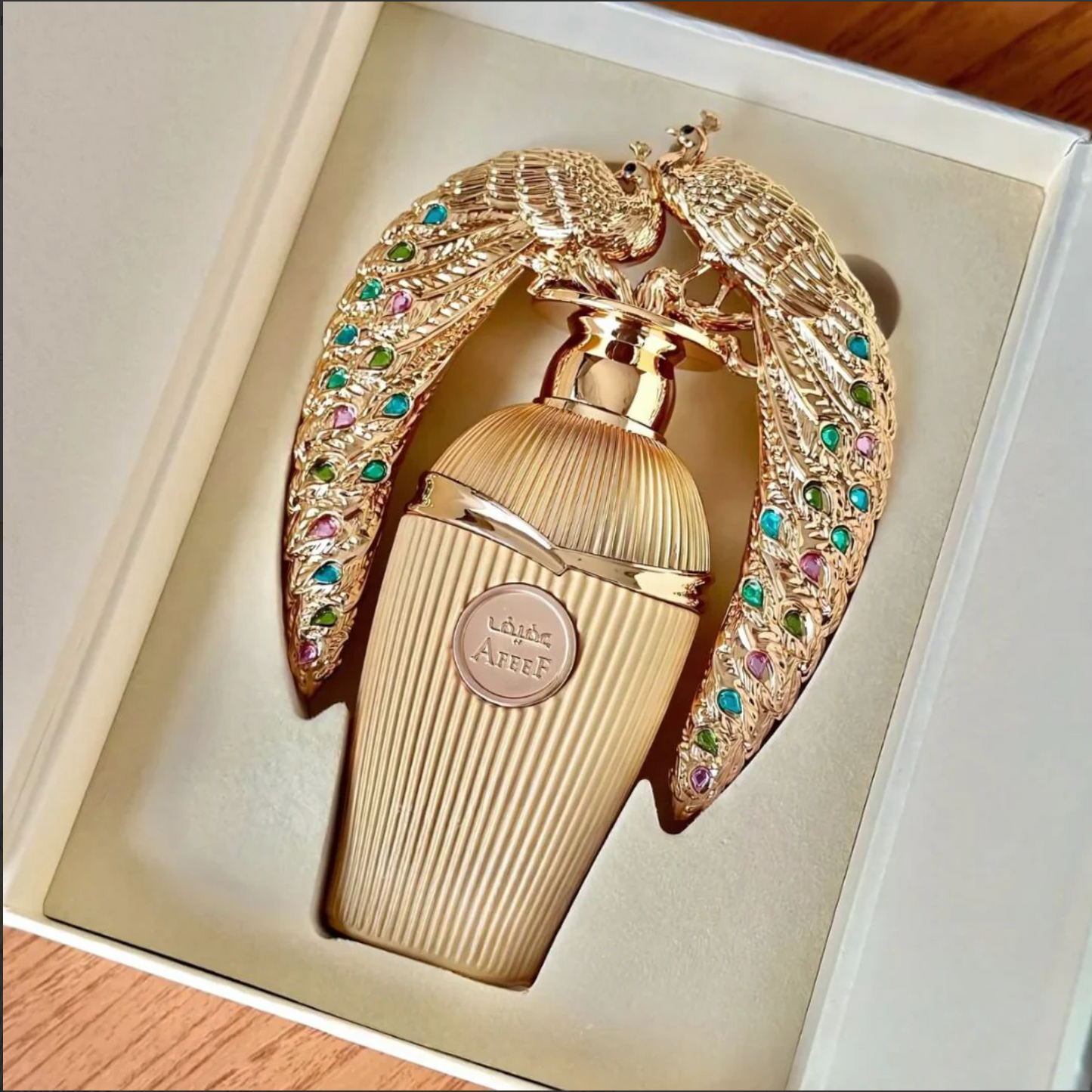 Afeef Eau De Parfum Spray 100ML (3.4 OZ) by Lattafa | An Exotic Fusion of Juicy Peach, Opulent Florals & Warm, Seductive Woods.
